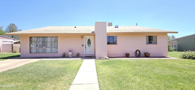 2201 E 7th St, Douglas, AZ 85607 - ranch-style home with a front lawn and brick siding
