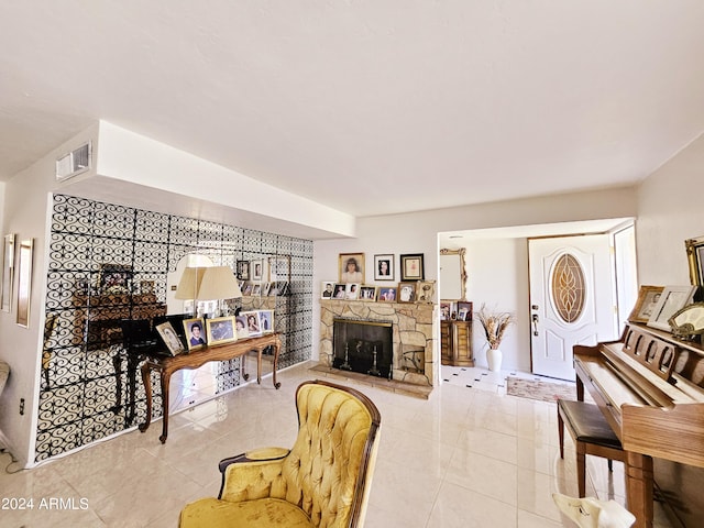 2201 E 7th St, Douglas, AZ 85607 - living area with a fireplace and light tile patterned flooring