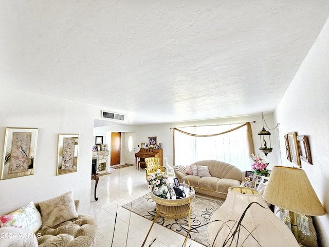 2201 E 7th St, Douglas, AZ 85607 - living area with a textured ceiling and light tile patterned floors