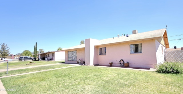 2201 E 7th St, Douglas, AZ 85607 - view of front of property featuring a front lawn and brick siding