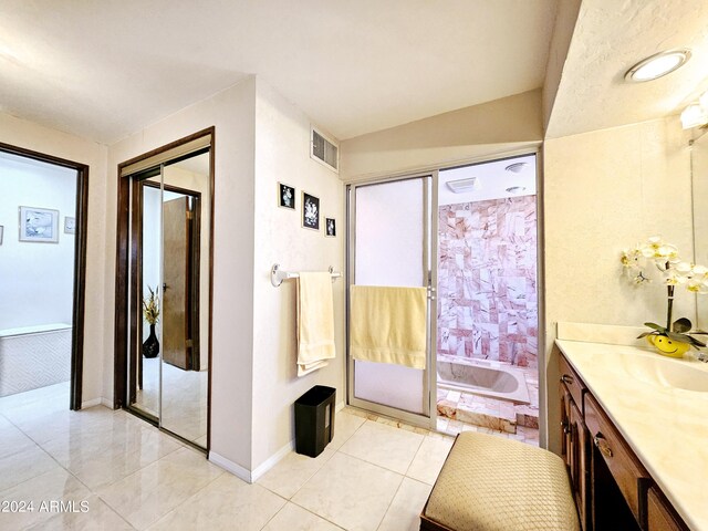 2201 E 7th St, Douglas, AZ 85607 - full bath featuring vanity, tile patterned floors, a bathtub, and a shower