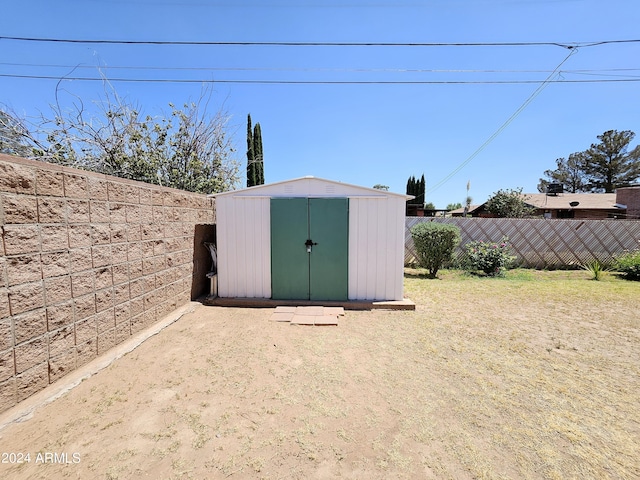 2201 E 7th St, Douglas, AZ 85607 - view of shed featuring a fenced backyard