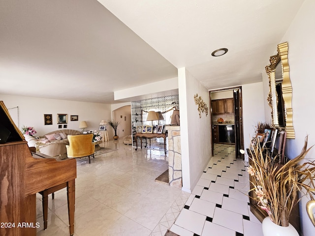 2201 E 7th St, Douglas, AZ 85607 - hallway featuring arched walkways and light tile patterned flooring
