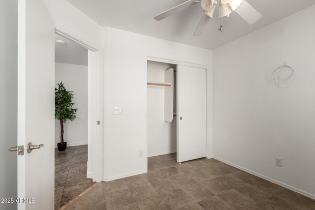 6515 W Hughes Dr, Phoenix, AZ 85043 - unfurnished bedroom featuring a closet and a ceiling fan