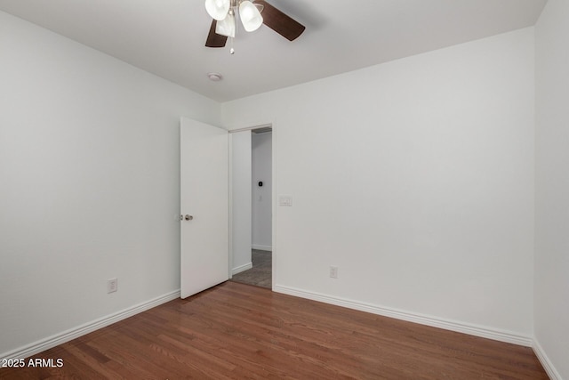 6515 W Hughes Dr, Phoenix, AZ 85043 - empty room with wood finished floors, ceiling fan, and a smoke detector