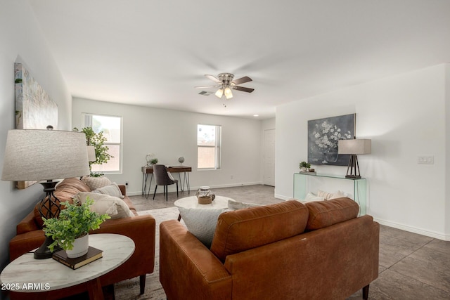 6515 W Hughes Dr, Phoenix, AZ 85043 - living room with ceiling fan and baseboards