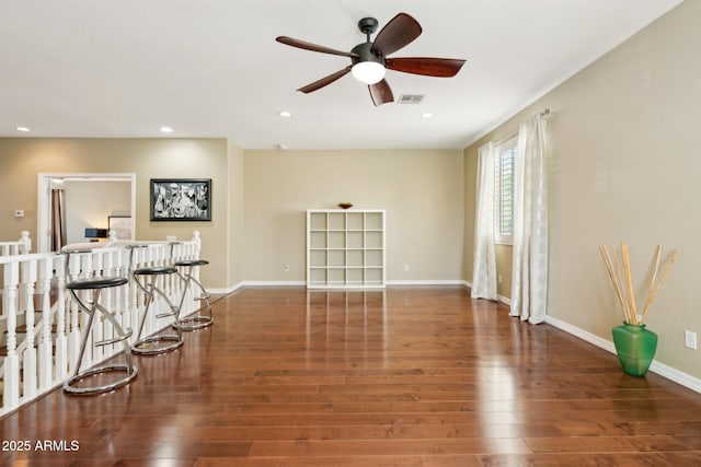 empty room with recessed lighting, ceiling fan, visible vents, and wood finished floors