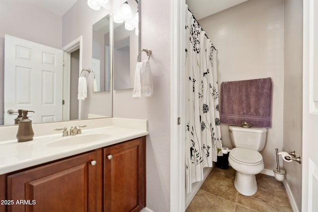 full bathroom with tile patterned flooring, vanity, toilet, baseboards, and curtained shower