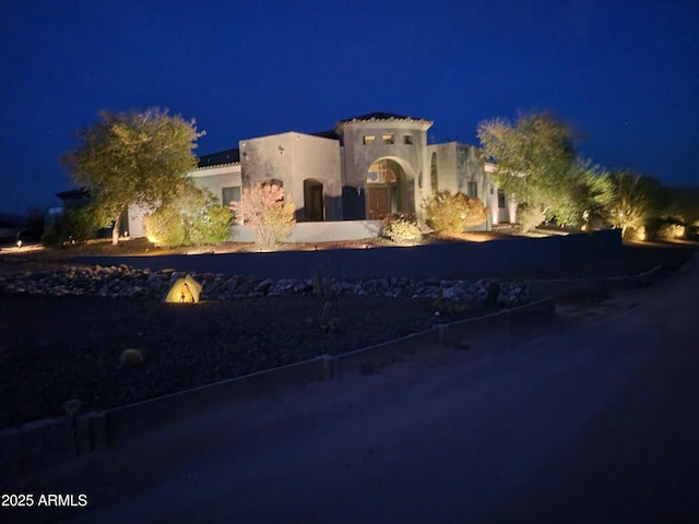 view of front of property with stucco siding