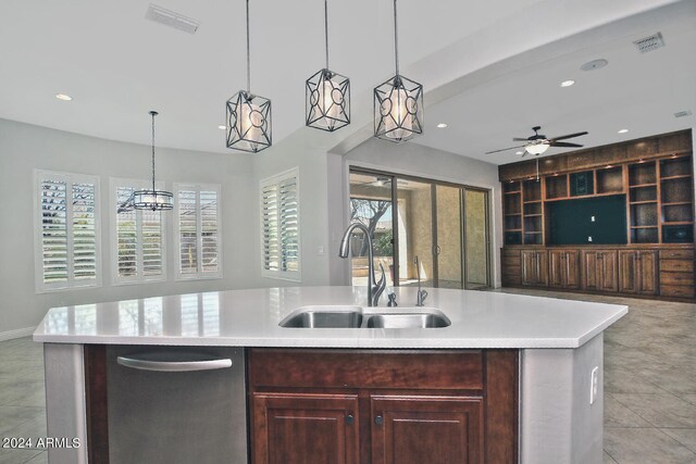 kitchen featuring hanging light fixtures, dishwasher, ceiling fan, and light tile flooring