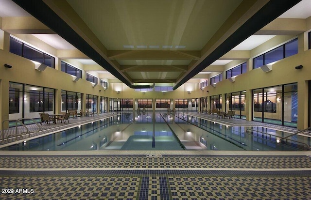 view of pool featuring a hot tub