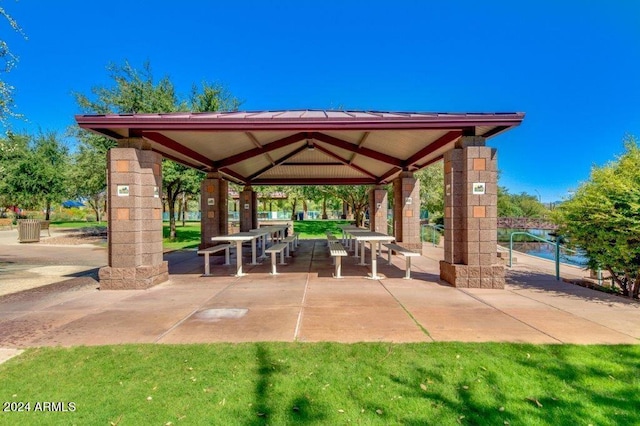 view of property's community with a gazebo and a patio