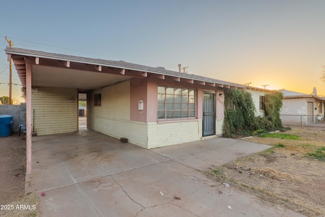 view of front of house featuring a carport