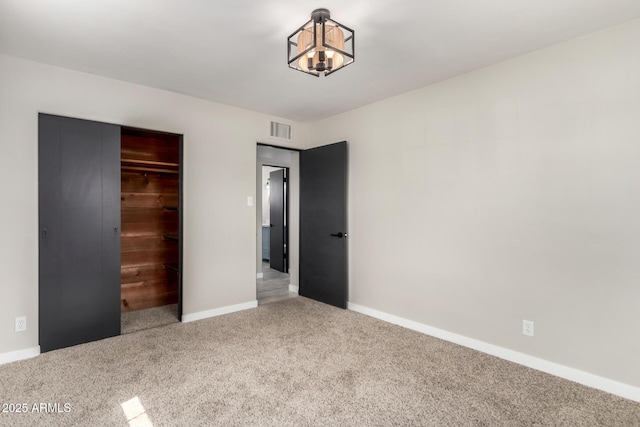 1010 W 5th Pl, Mesa, AZ 85201 - unfurnished bedroom with carpet, baseboards, and a closet
