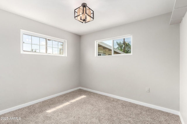 1010 W 5th Pl, Mesa, AZ 85201 - carpeted empty room with a chandelier and baseboards