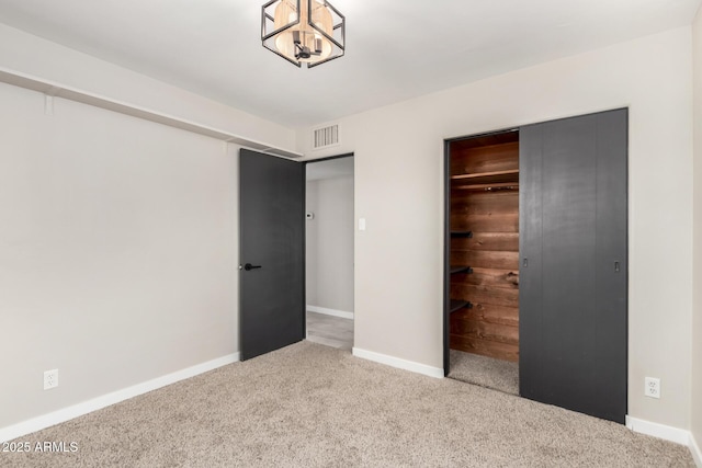 1010 W 5th Pl, Mesa, AZ 85201 - unfurnished bedroom with carpet flooring, baseboards, and a closet