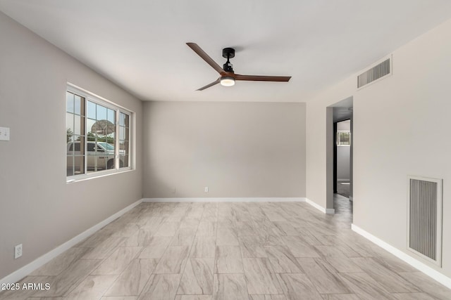 1010 W 5th Pl, Mesa, AZ 85201 - spare room featuring ceiling fan and baseboards