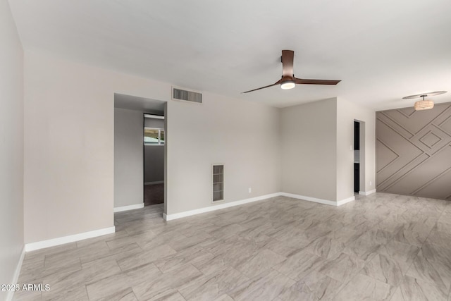 1010 W 5th Pl, Mesa, AZ 85201 - empty room with a ceiling fan and baseboards