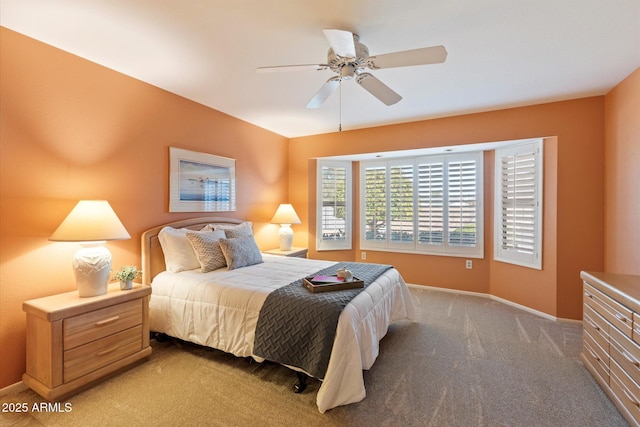 bedroom with ceiling fan and carpet floors