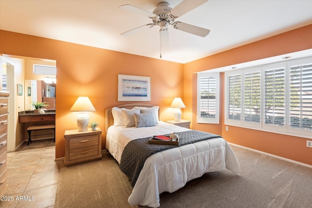 tiled bedroom with ceiling fan