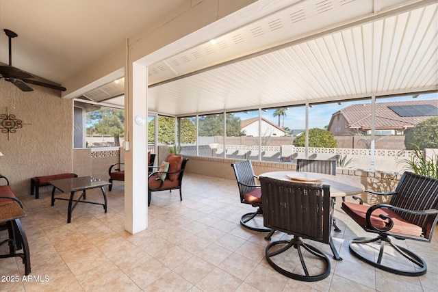 view of patio featuring ceiling fan