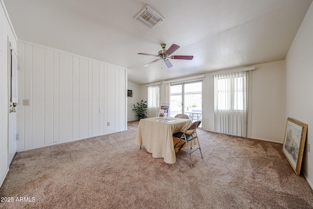 10326 W Pleasant Valley Rd, Sun City, AZ 85351 - dining area featuring ceiling fan, visible vents, and light colored carpet