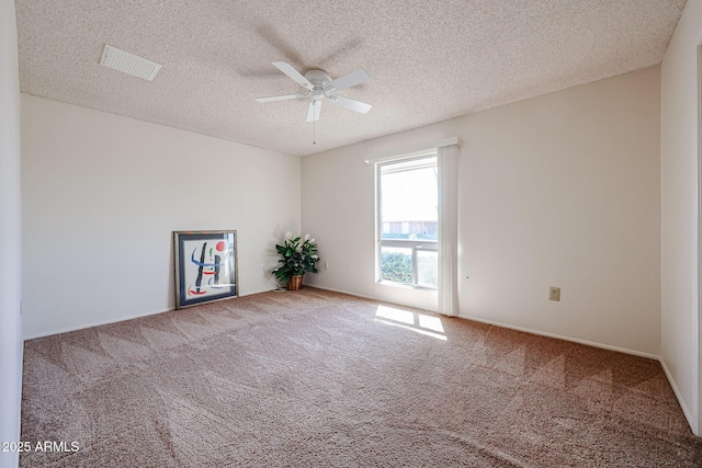 10326 W Pleasant Valley Rd, Sun City, AZ 85351 - unfurnished room with a ceiling fan, visible vents, a textured ceiling, and carpet flooring