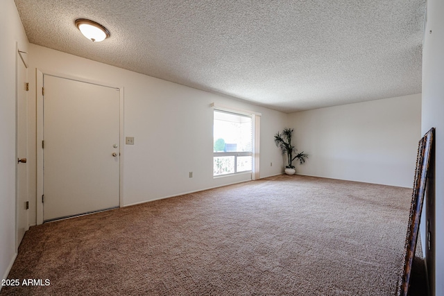 10326 W Pleasant Valley Rd, Sun City, AZ 85351 - carpeted spare room with a textured ceiling