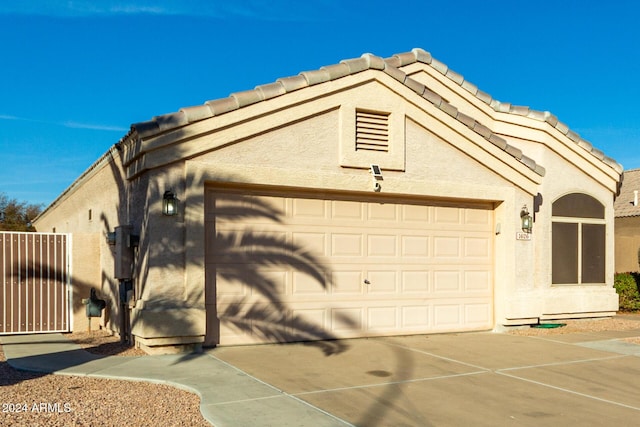 view of front of home featuring a garage