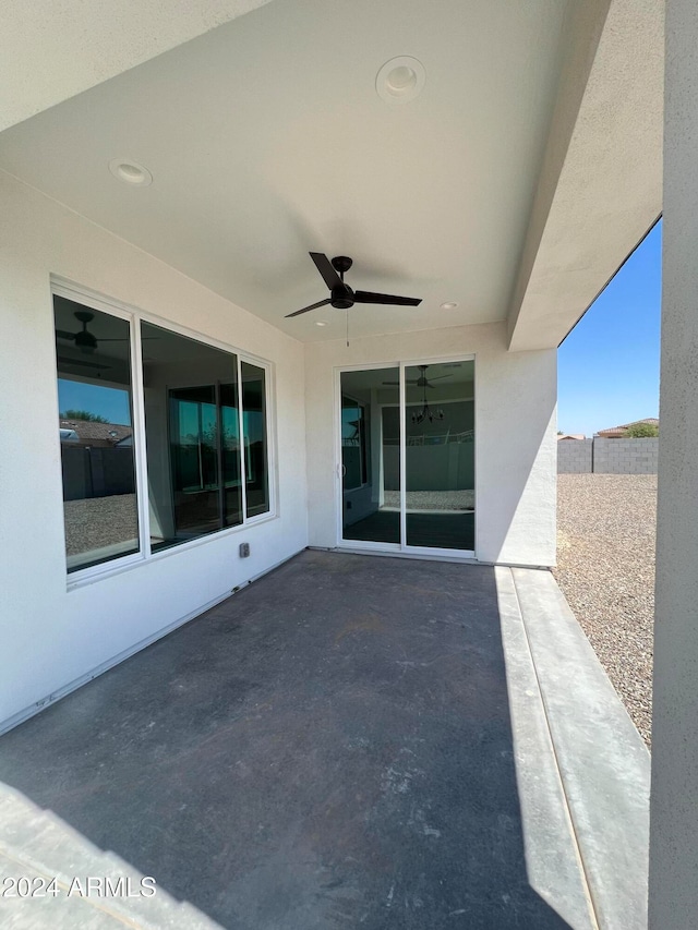 view of patio / terrace featuring ceiling fan