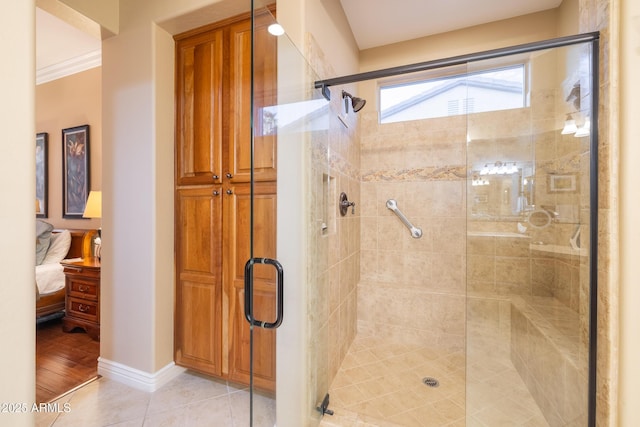 bathroom featuring walk in shower and tile patterned floors