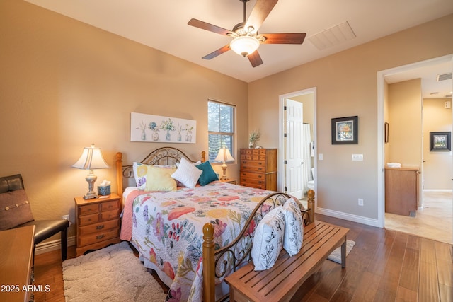 bedroom featuring hardwood / wood-style flooring and ceiling fan