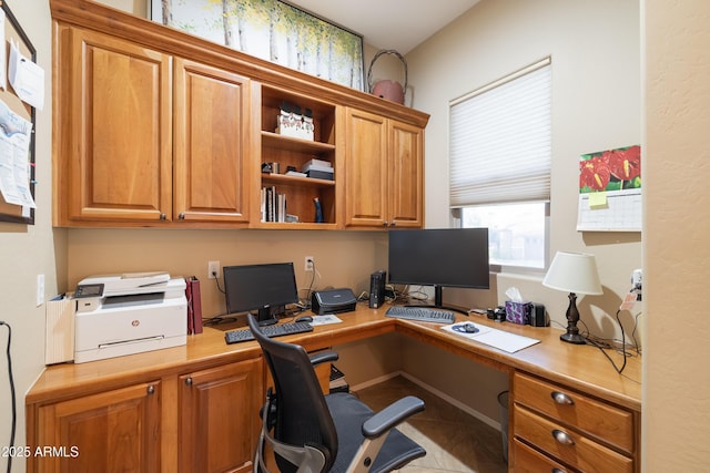 home office featuring built in desk