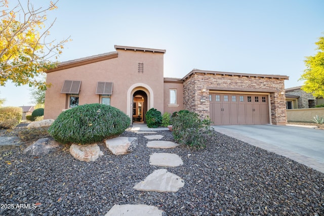 view of front of property featuring a garage