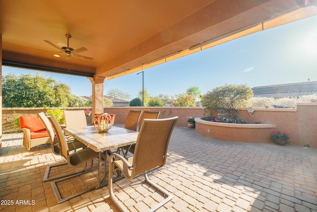 view of patio / terrace featuring ceiling fan