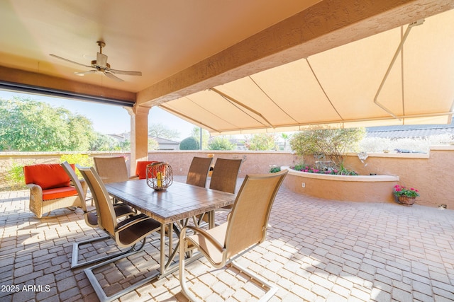 view of patio / terrace featuring ceiling fan