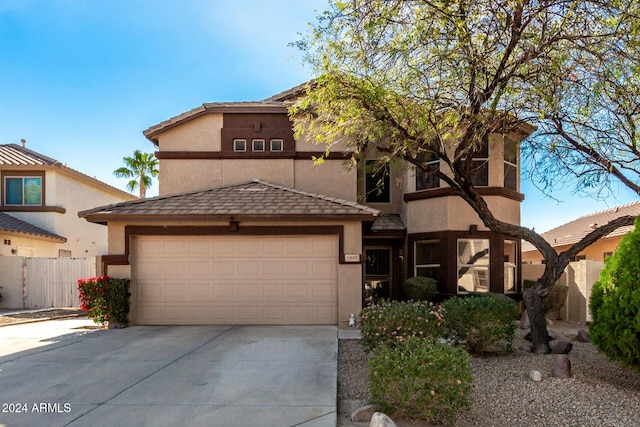 view of front of property with a garage