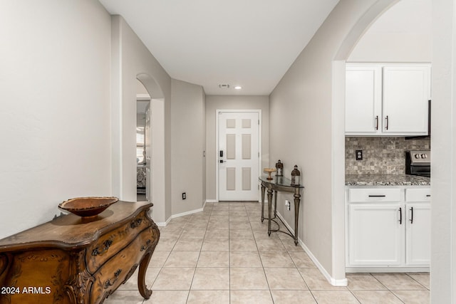 interior space with light tile patterned floors