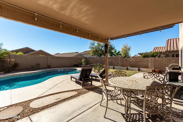 view of pool with a patio area