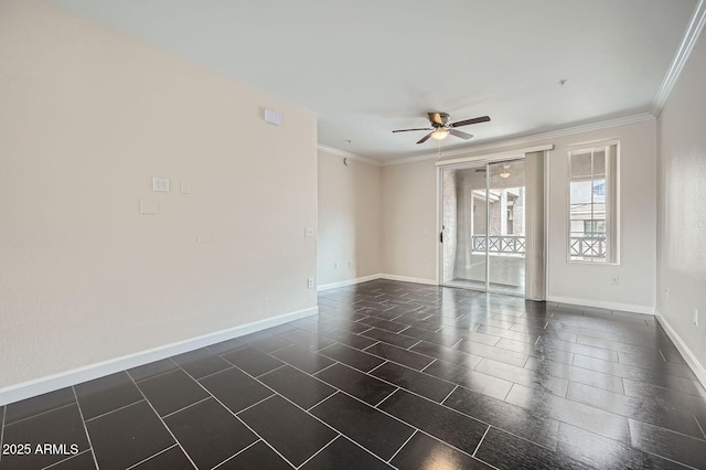 spare room with baseboards, a ceiling fan, and ornamental molding