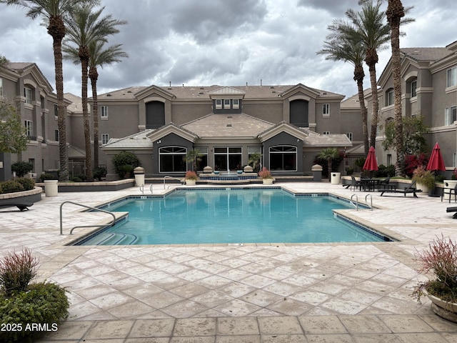 pool featuring a patio