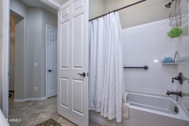 bathroom featuring shower / tub combo with curtain and tile patterned flooring