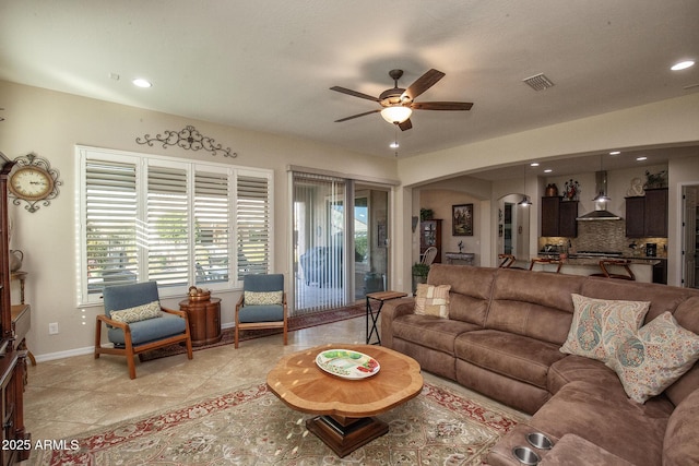 living room with ceiling fan