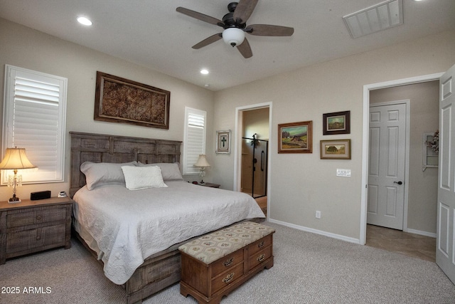 carpeted bedroom featuring ceiling fan