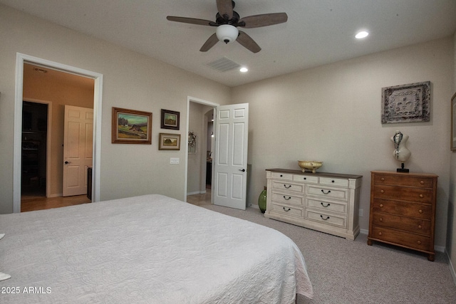 carpeted bedroom featuring ceiling fan