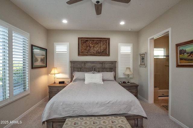 bedroom with ceiling fan and light colored carpet