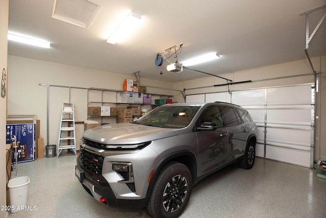 garage featuring a garage door opener