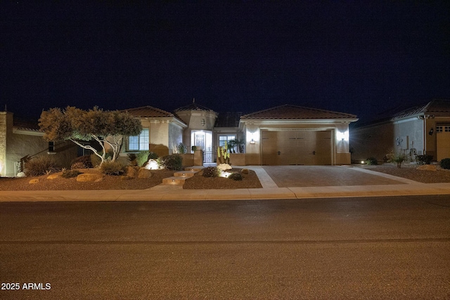 ranch-style house featuring a garage