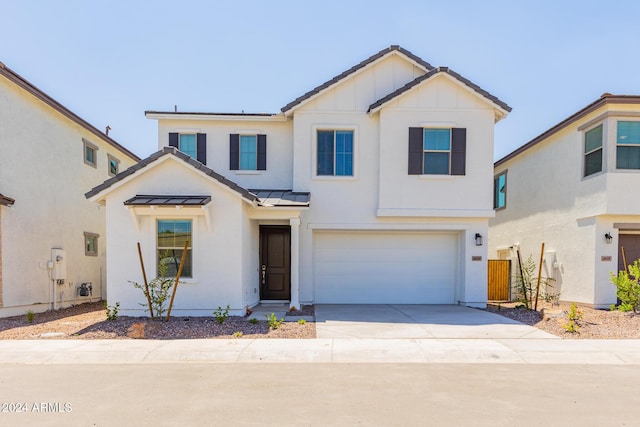 view of front of property featuring a garage