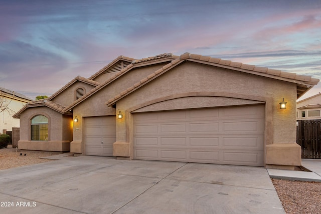 view of front of property featuring a garage